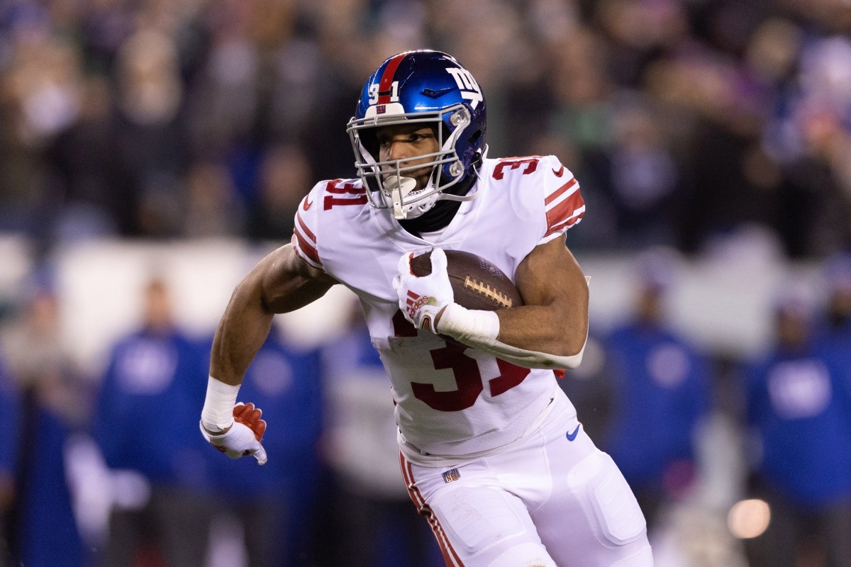 Jan 21, 2023; Philadelphia, Pennsylvania, USA; New York Giants running back Matt Breida (31) runs for a touchdown against the Philadelphia Eagles in the third quarter during an NFC divisional round game at Lincoln Financial Field.
